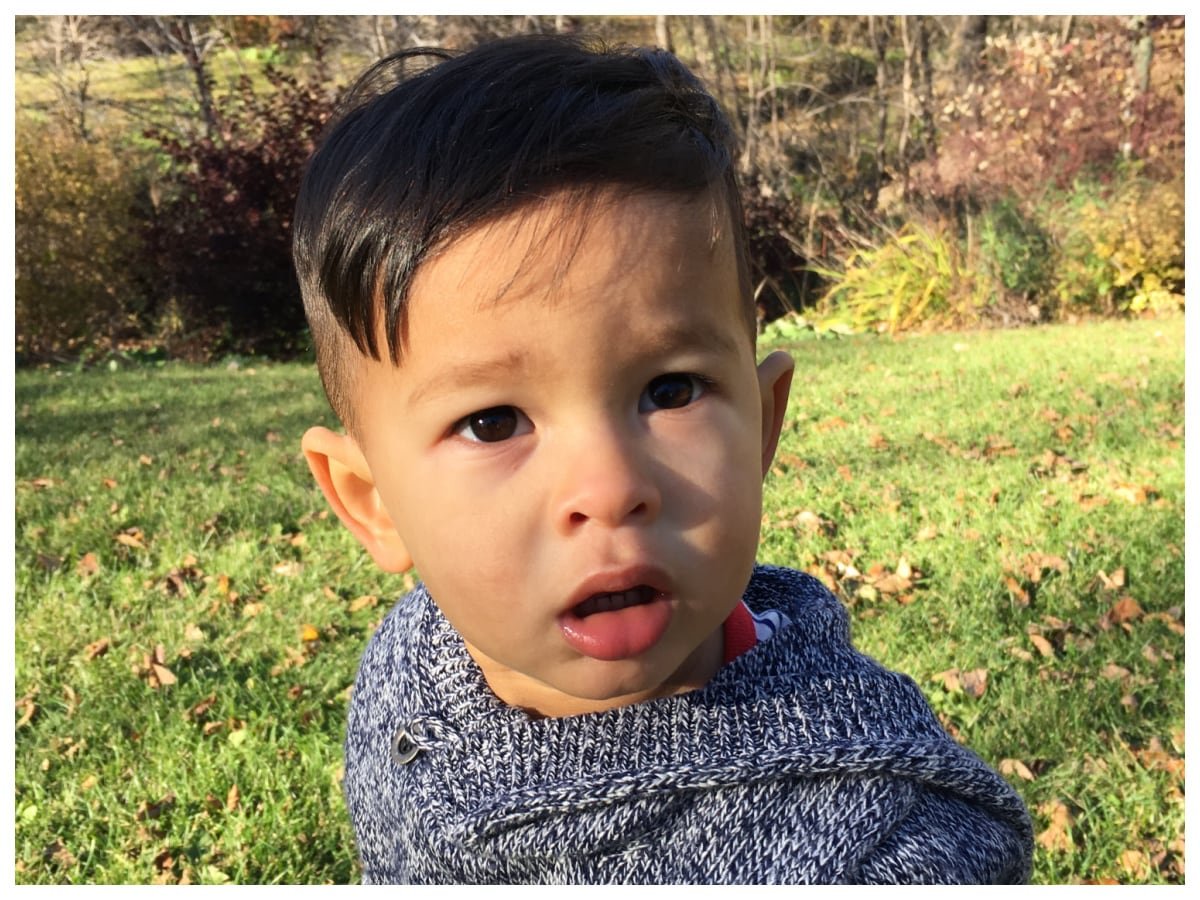 A photo showing Simon's eagerness for independence as a young child.