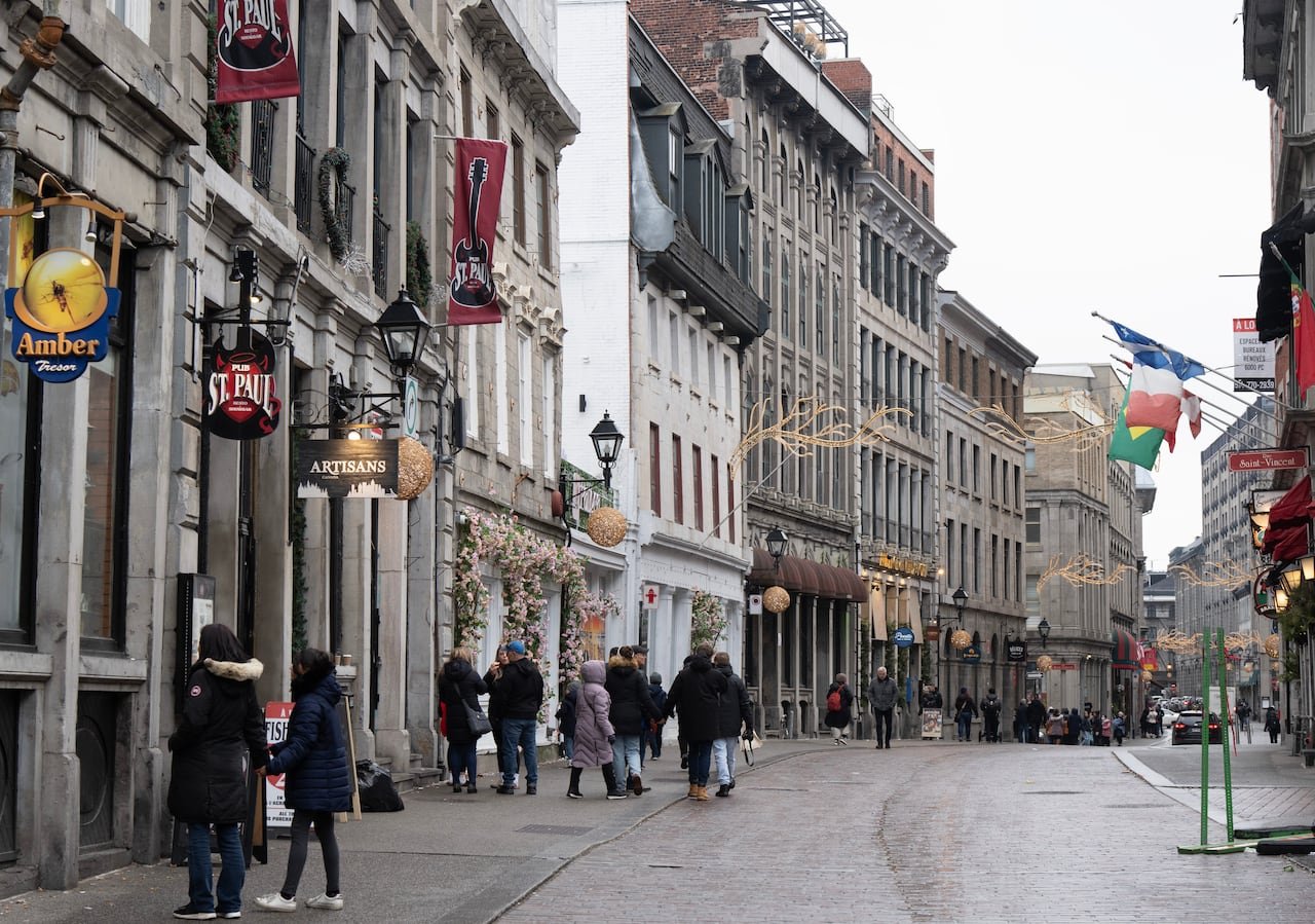 default-621 People walk on cobblestone streets in winter