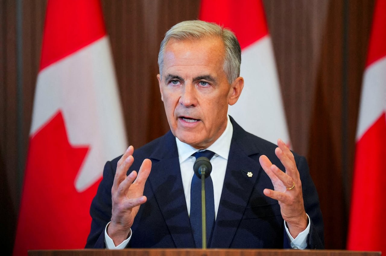 default-562 Canadaâs Prime Minister Mark Carney speaks with the news media after he suspended trade negotiations with the United States, in Ottawa, Ontario, Canada August 22, 2026.